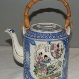 Japan :teapot decorated with elegant geisha in kimono