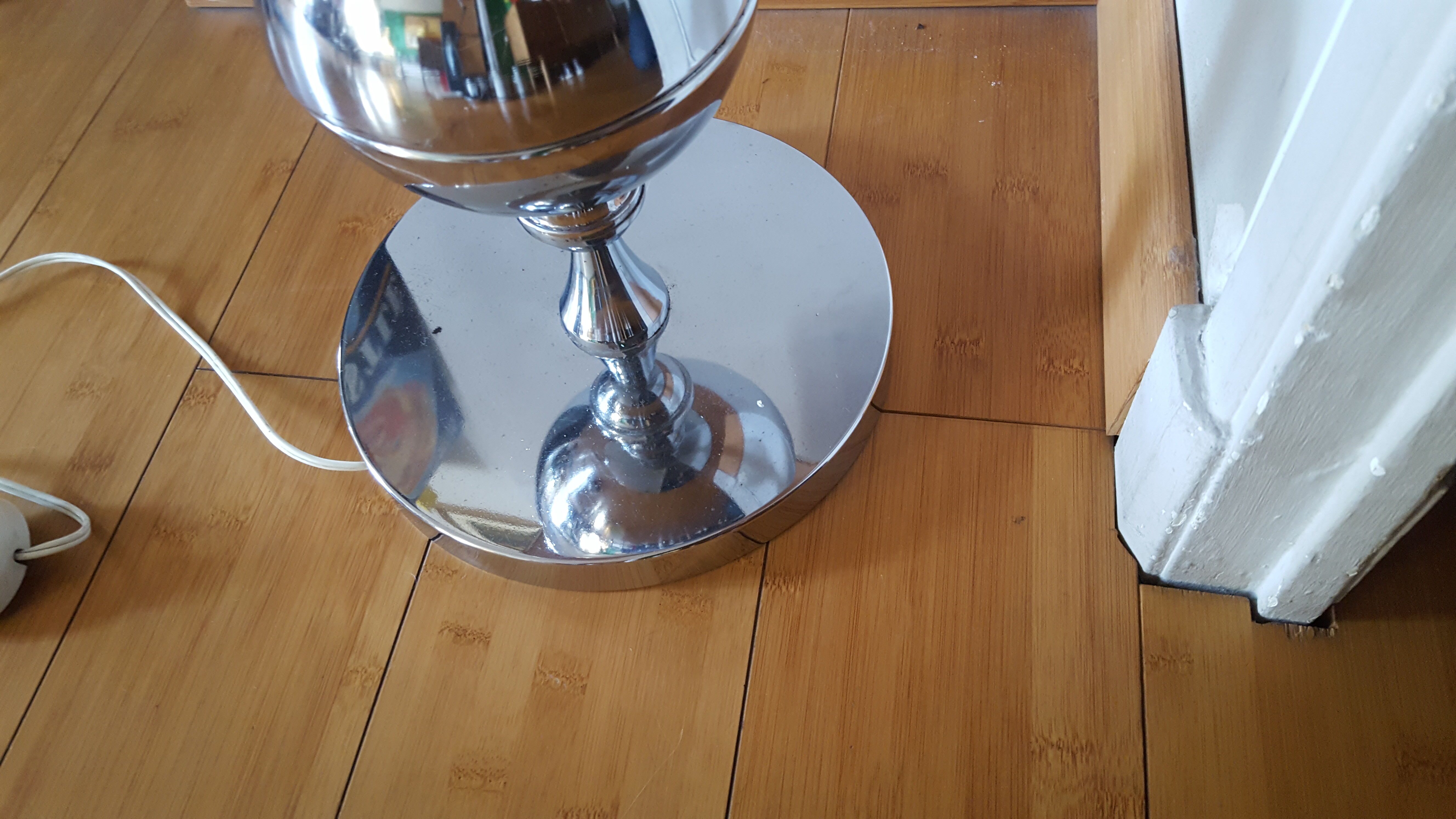 Vintage chrome lamppost from the 70s with its dayof