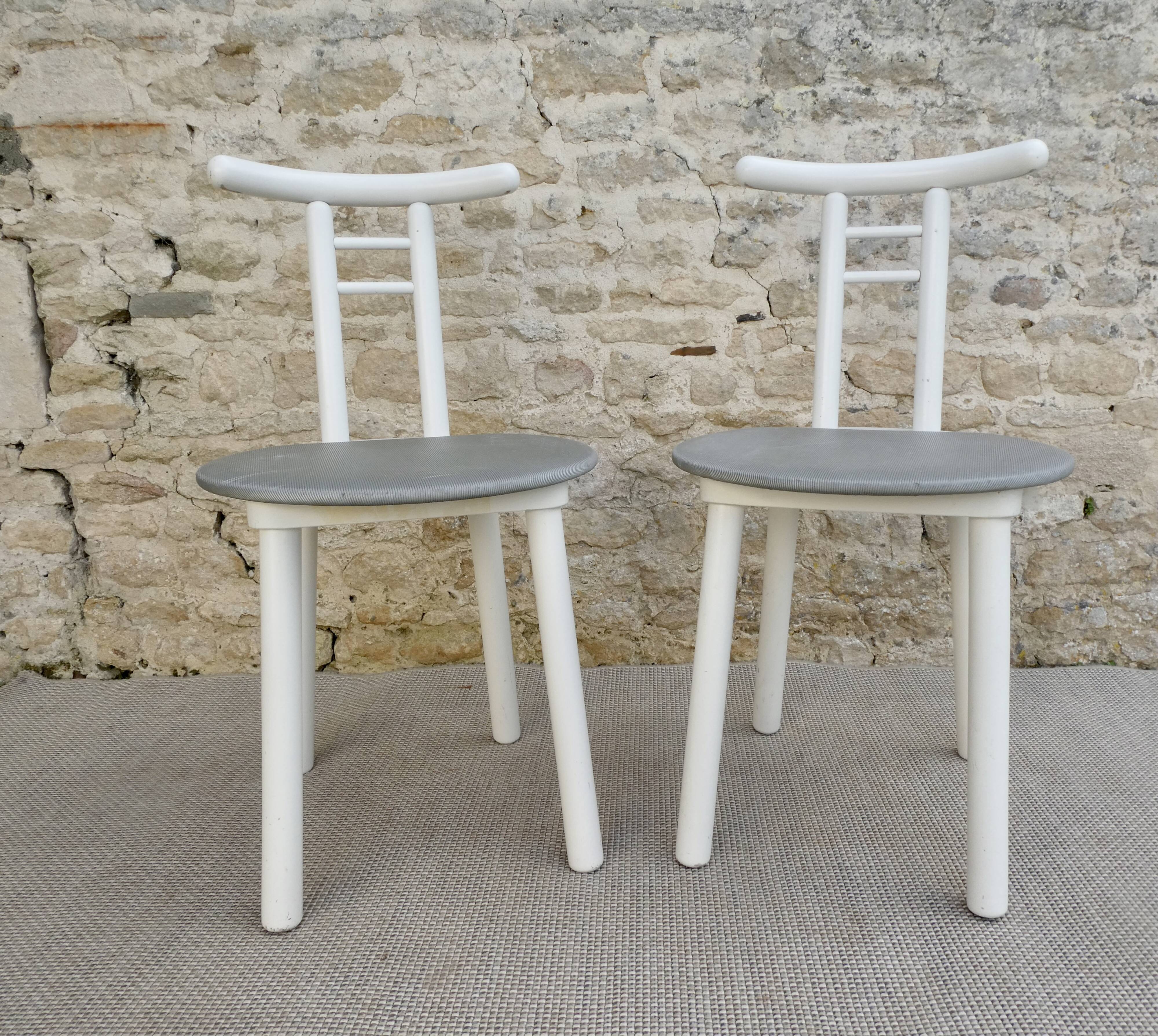 Pair of wooden and Skaï chairs from the 80s, Italy