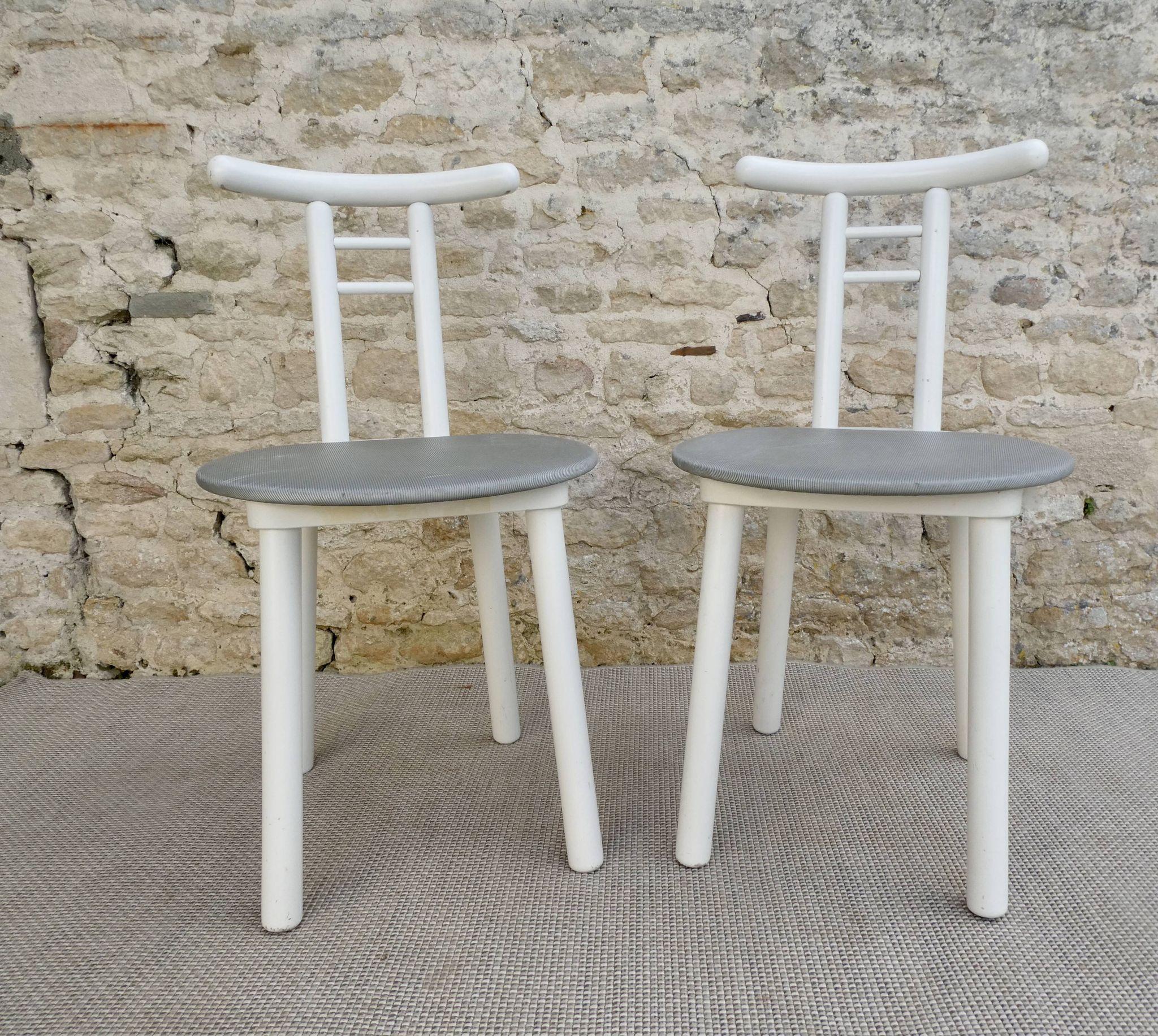 Pair of wooden and Skaï chairs from the 80s, Italy