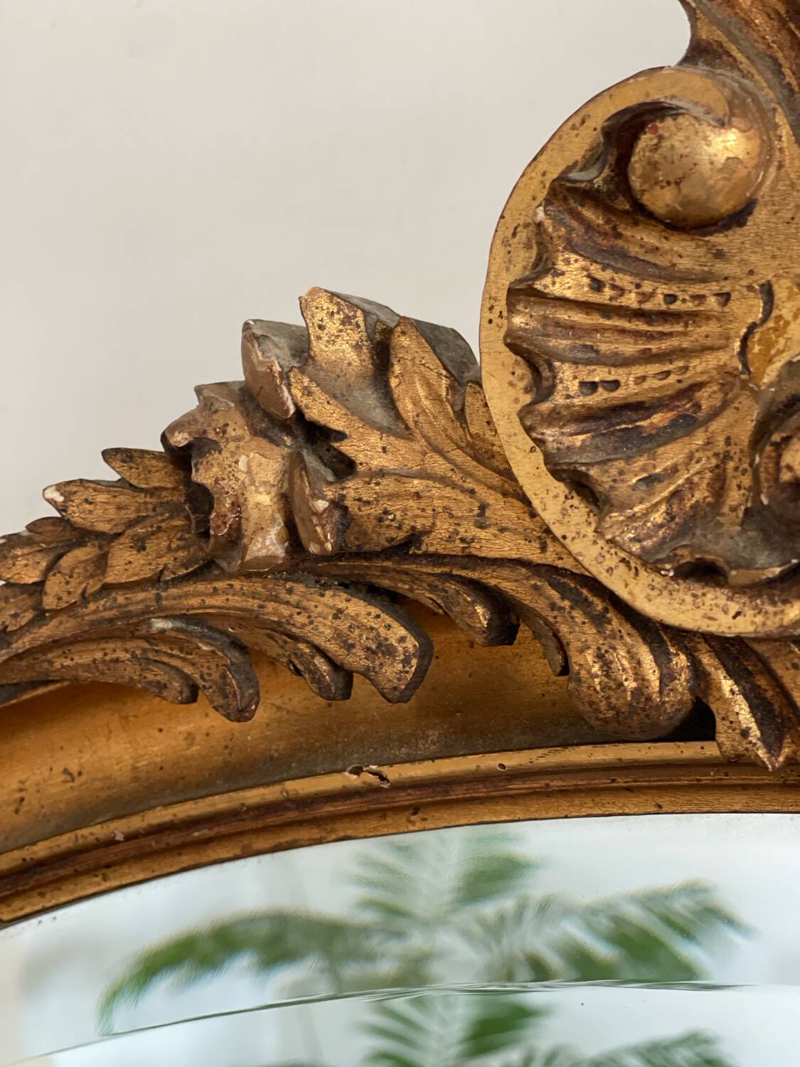 Antique oval gilt mirror.