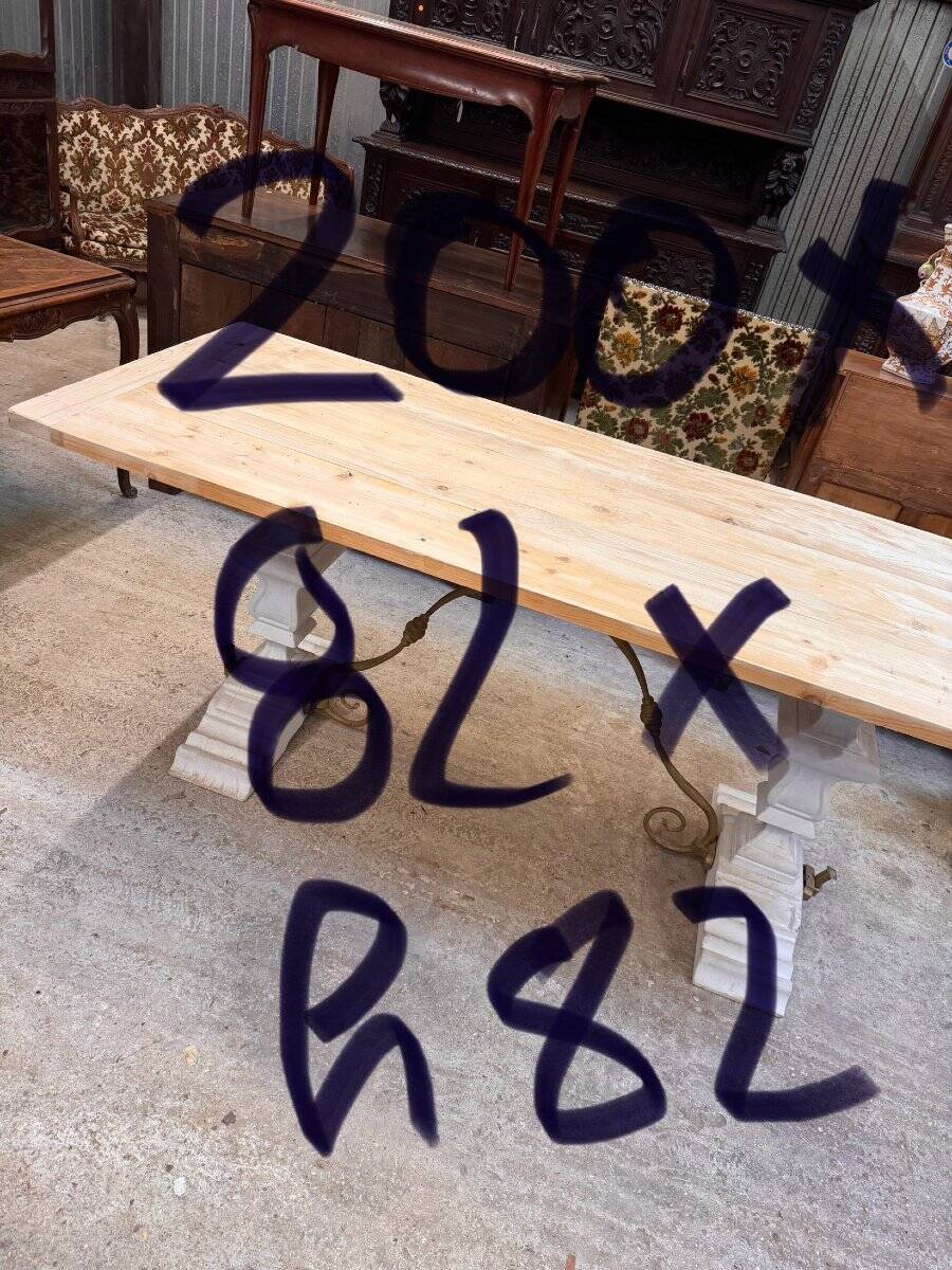 Industrial table with sandblasted top and bleached legs.