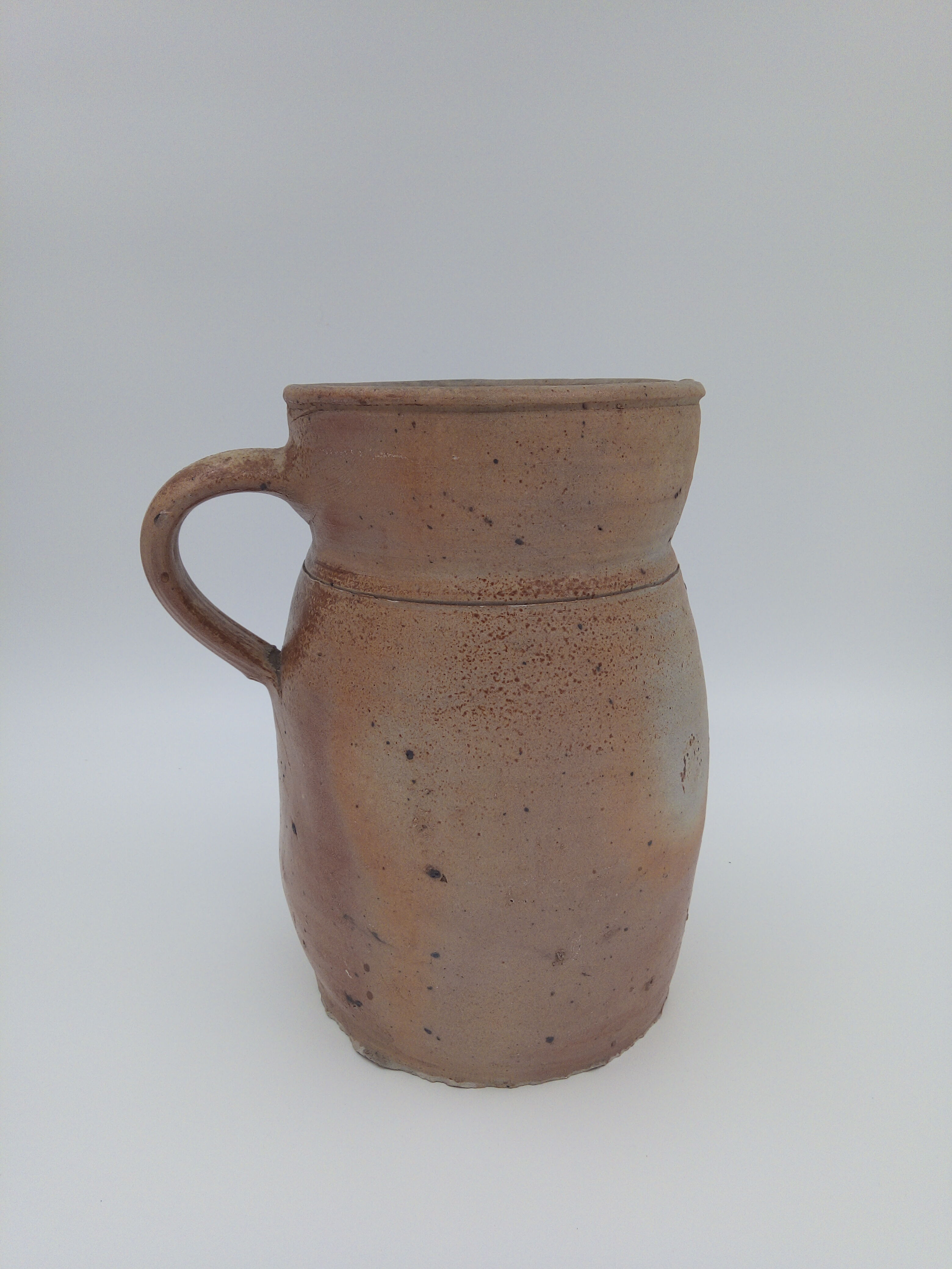 Pitcher in folk art sandstone