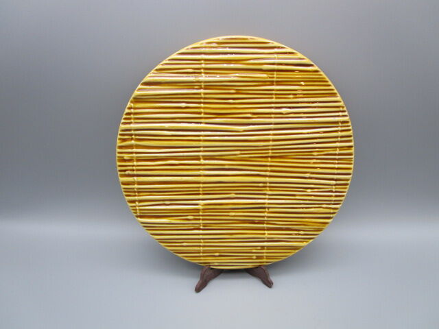 Vintage earthenware table mat