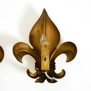 A pair of large 1970s gilt metal Fleur-de-Lis wall lamps by Hans Kögl