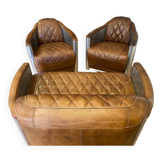 Set of leather and metal club chairs