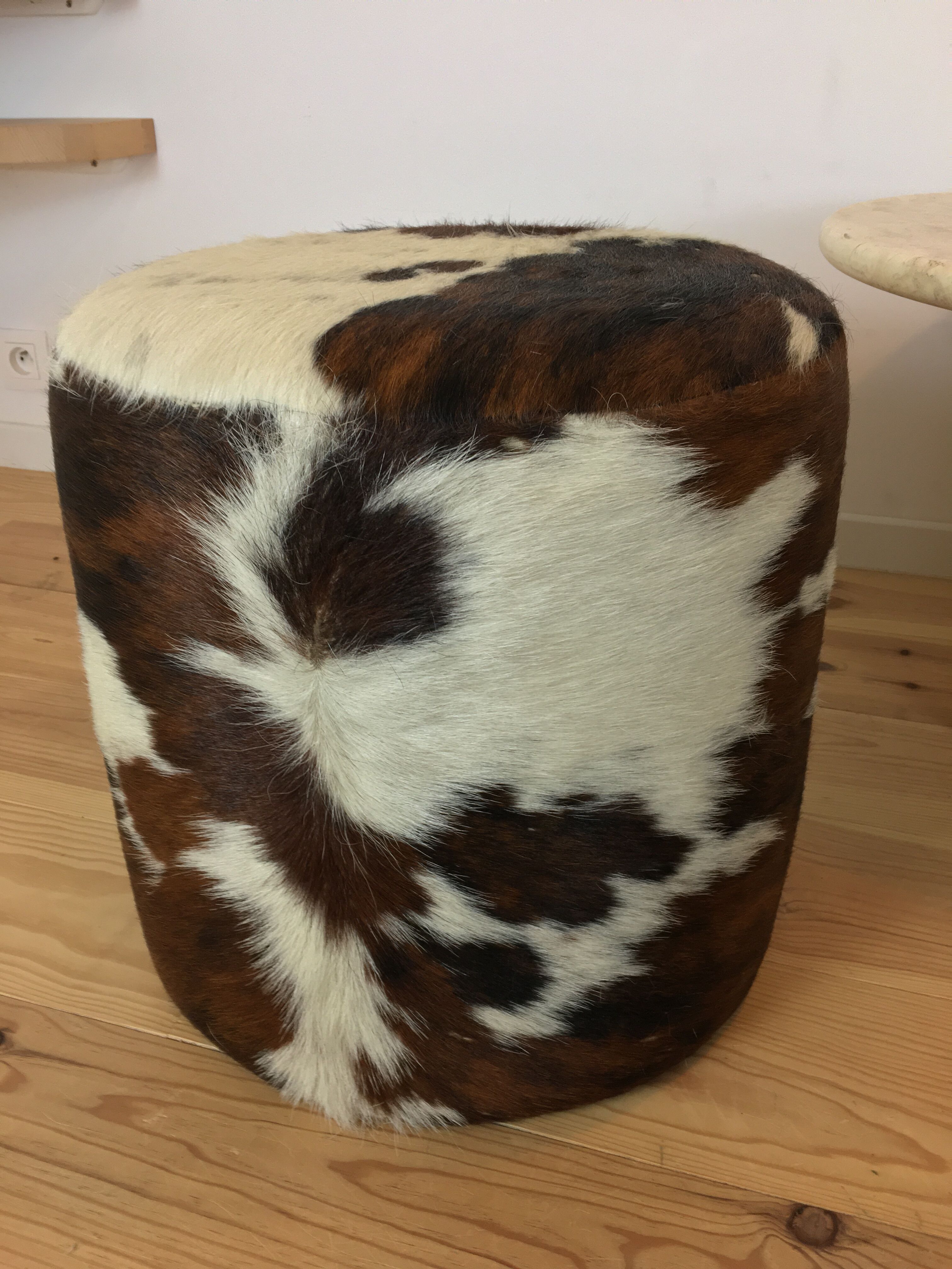 Pouf and cow cushion, leather
