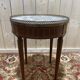 Table bouillotte de style Louis XVI en marqueterie et marbre