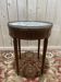 Table bouillotte de style Louis XVI en marqueteriie et marbre