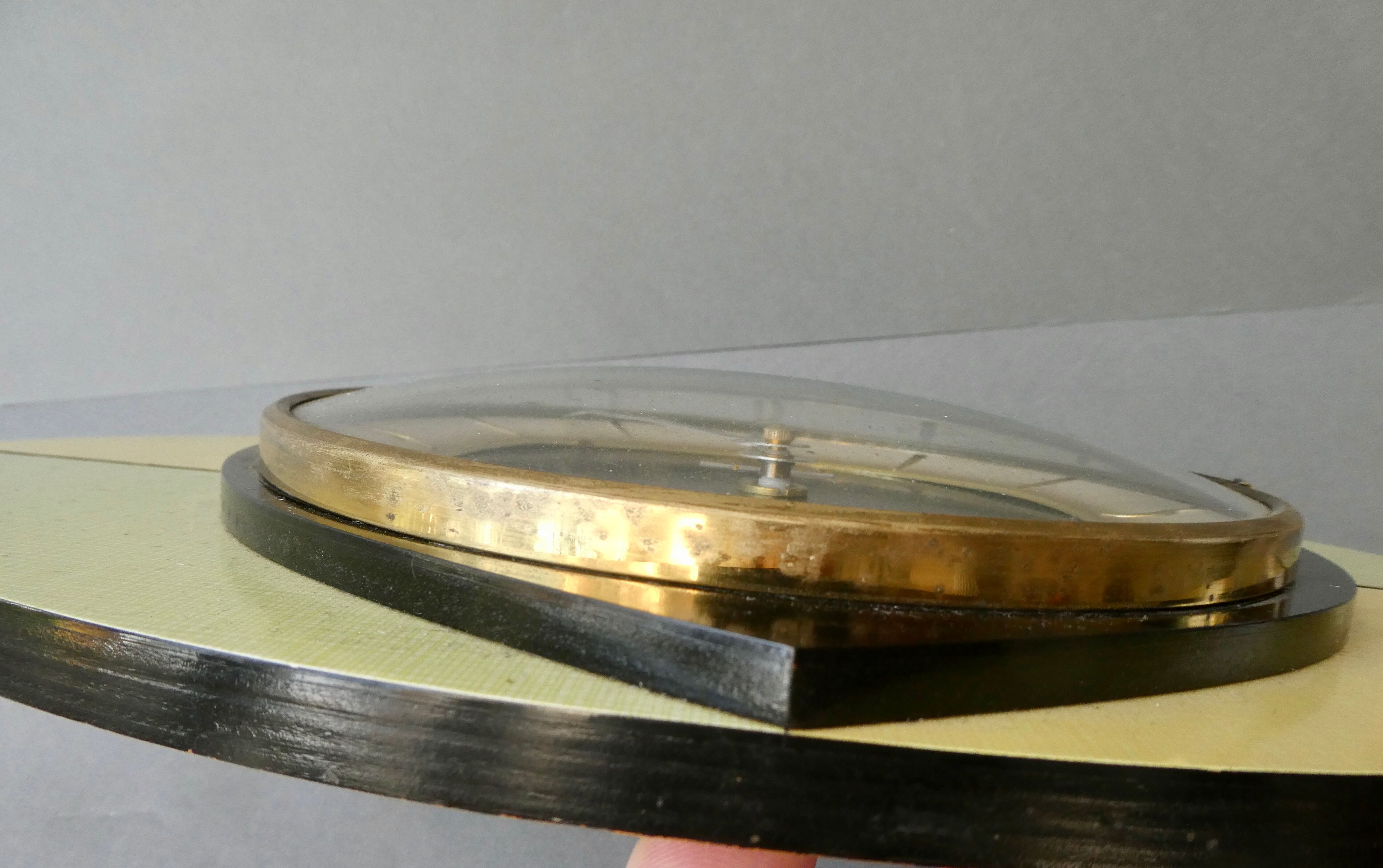 Ffr morbier clock from the 50s, in two-tone formica