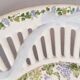Oval dish in openwork earthenware from Sarreguemines, blue ribbon and fruit