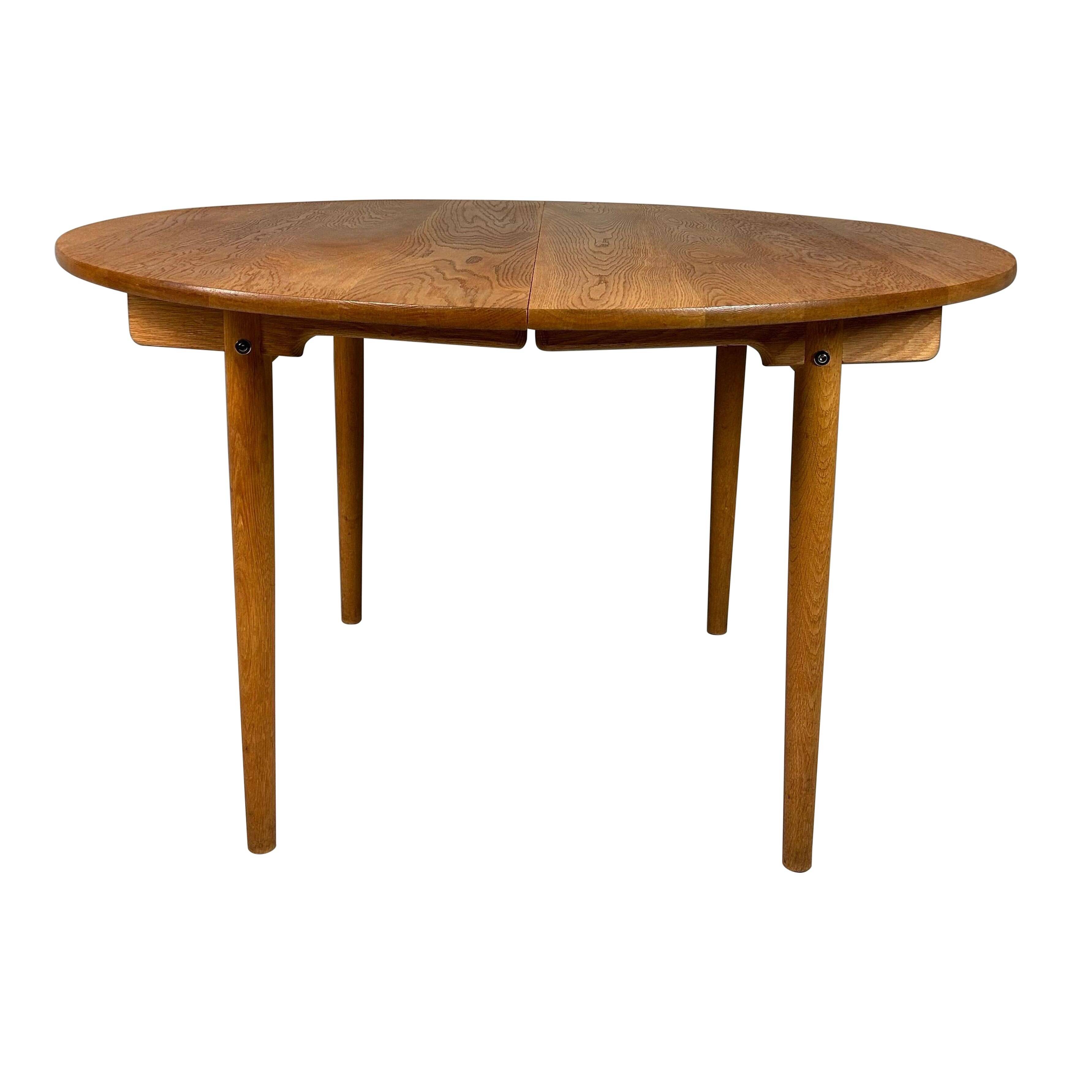 Hans J. Wegner round PP70 extendable dining table for Andreas Tuck, Denmark 1970
