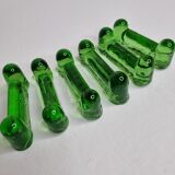 Set of six emerald glass knife holders signed Biot