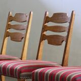Vintage 1960s Danish farmhouse oak dining chairs in the style of Henning Kjærnulf
