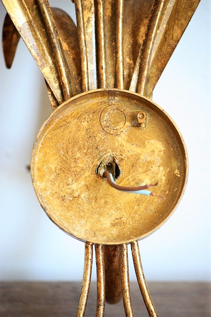 Applies "wheat sheaf" gold metal