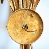 Applies "wheat sheaf" gold metal