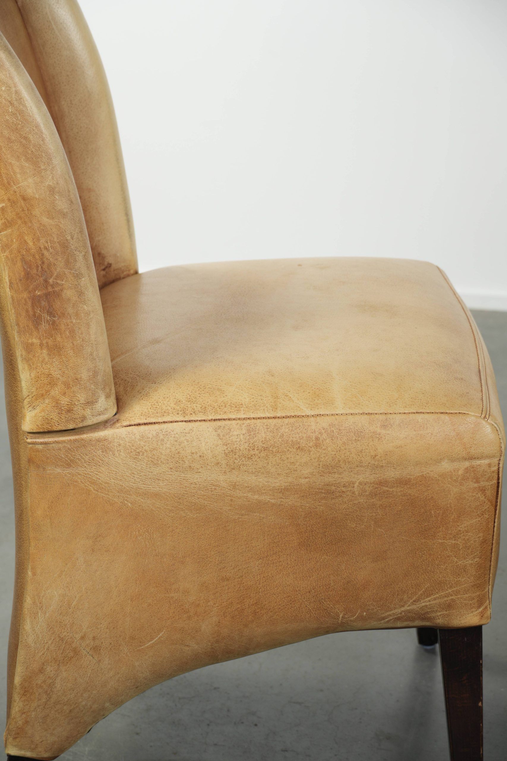 Set of six cowhide dining chairs with a comfortable seat and high back