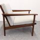 Living room, three-seater sofa and two armchairs, modernist in teak, France around 1950.