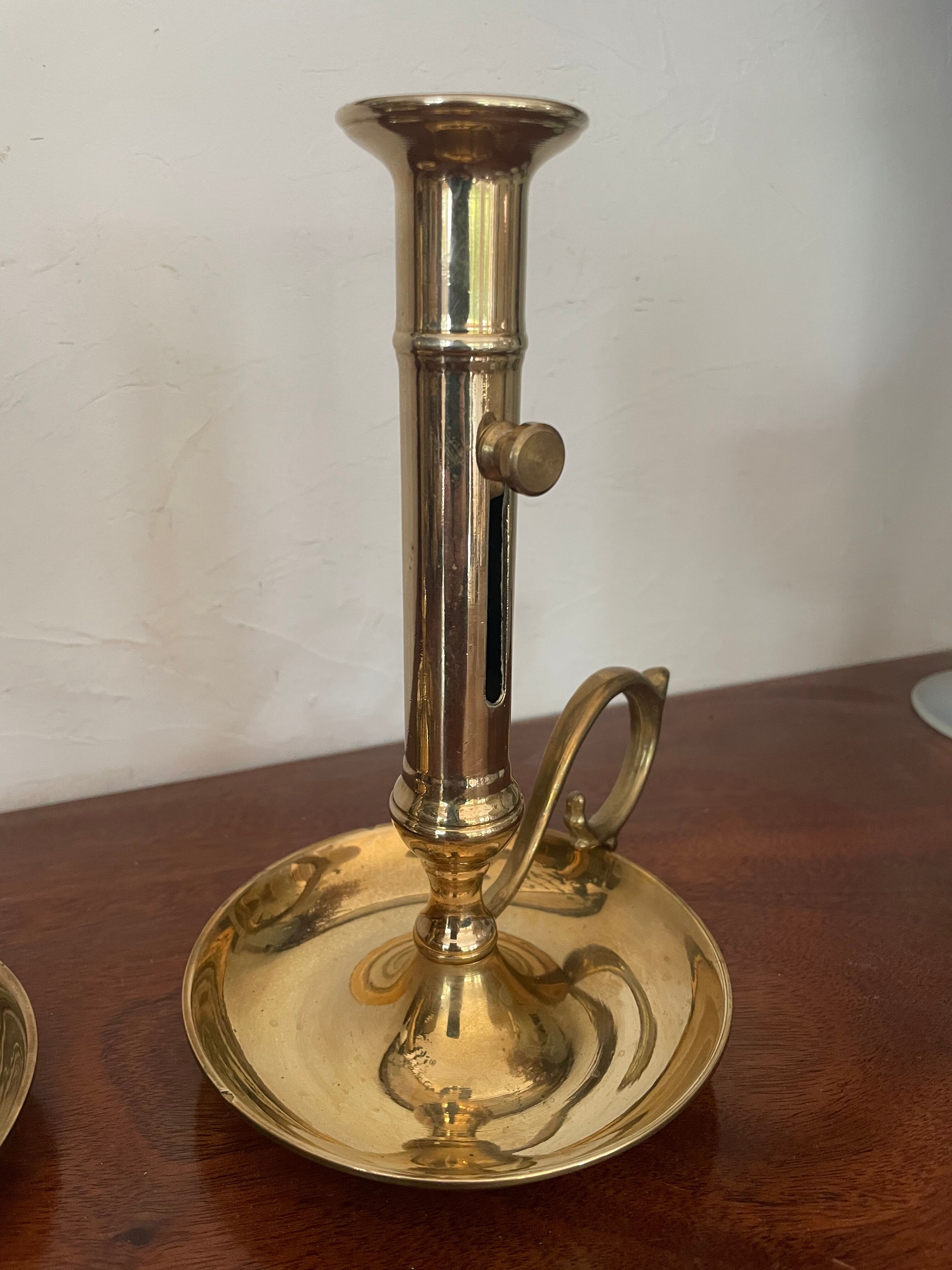 Pair of brass candle holders