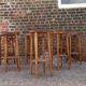Lot de 30 tabourets pieds compas hêtre Baumann