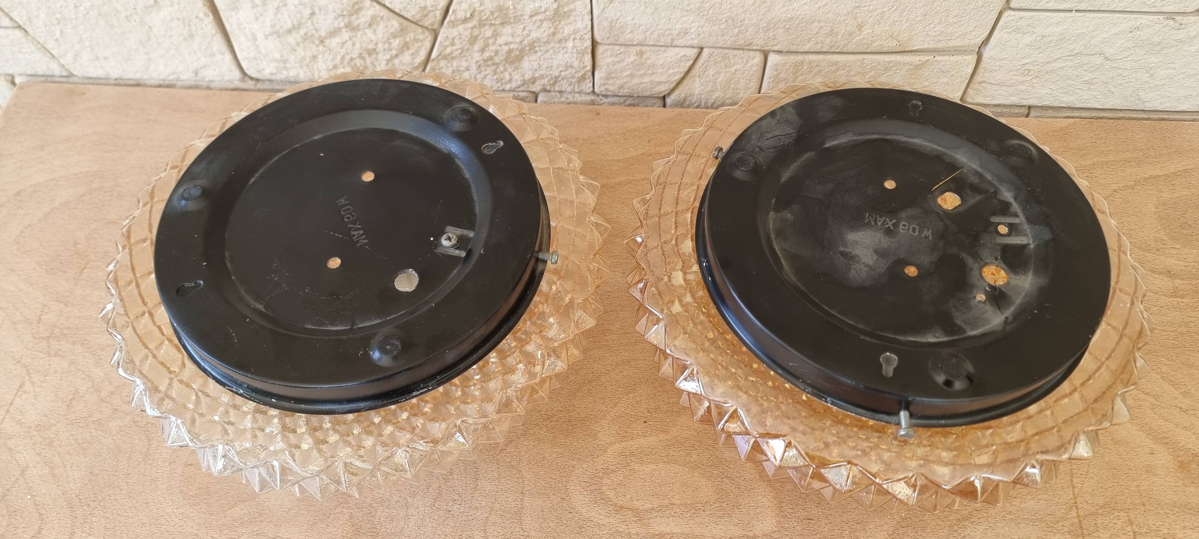 Pair of smoked glass ceiling lights
