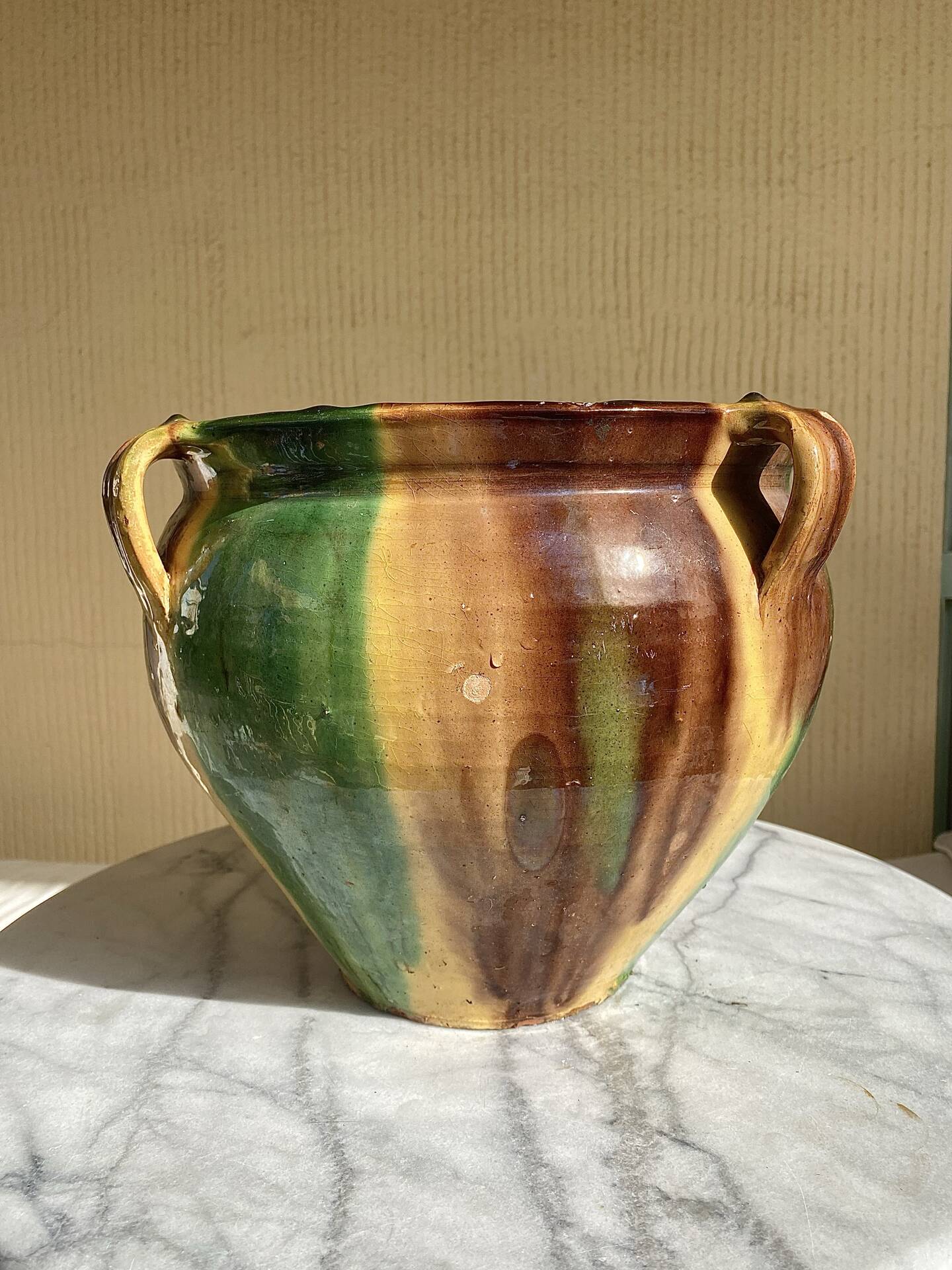 Ancient glazed terracotta pot from the 19th century, south-west France.