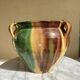Ancient glazed terracotta pot from the 19th century, south-west France.