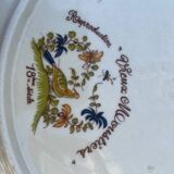 Set of two old Moustier plates