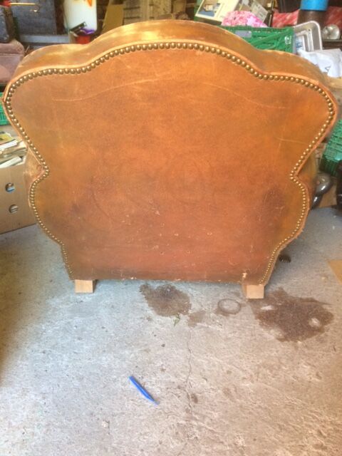 Old leather club armchair