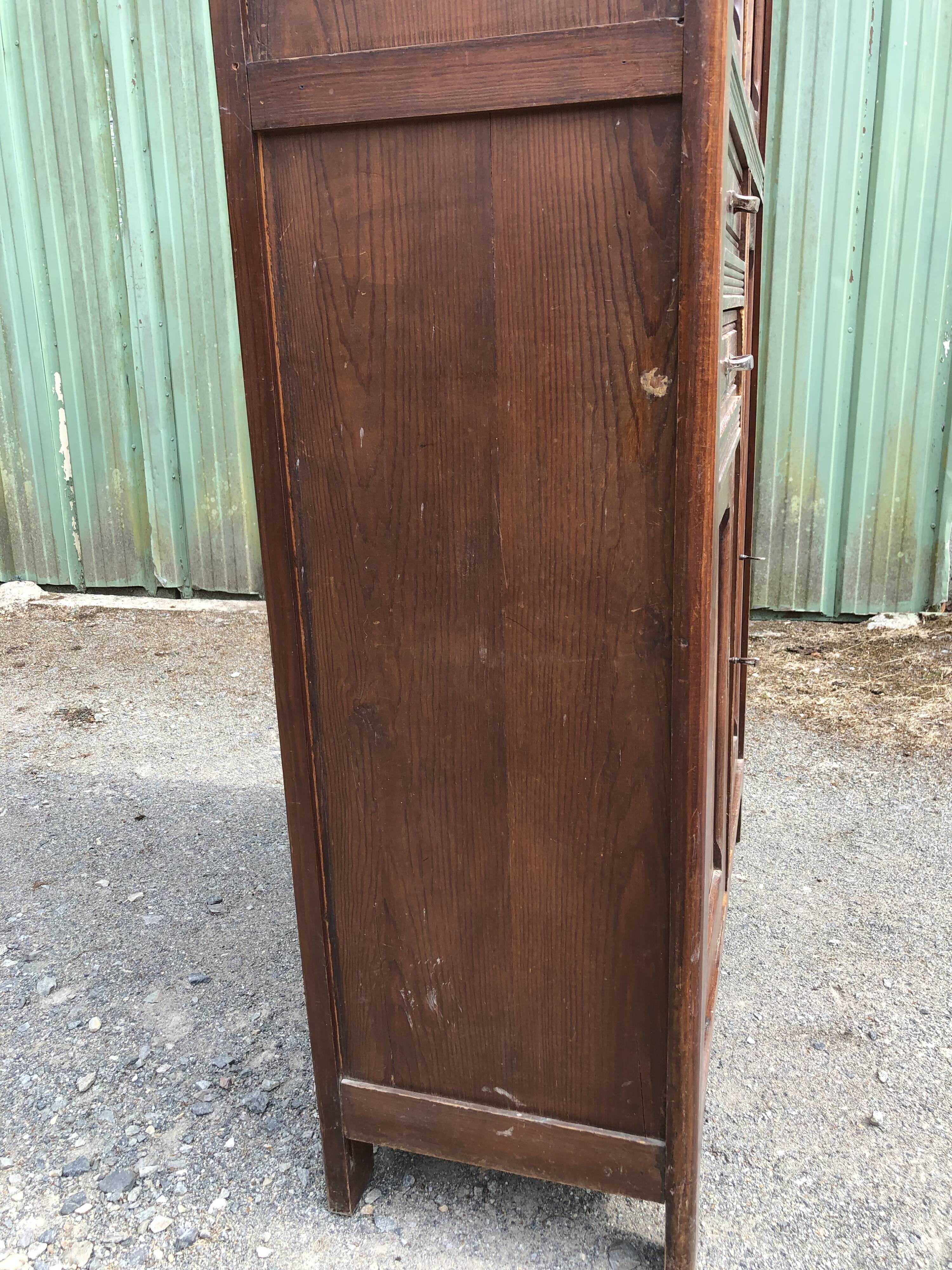 Vintage Parisian pine cabinet.