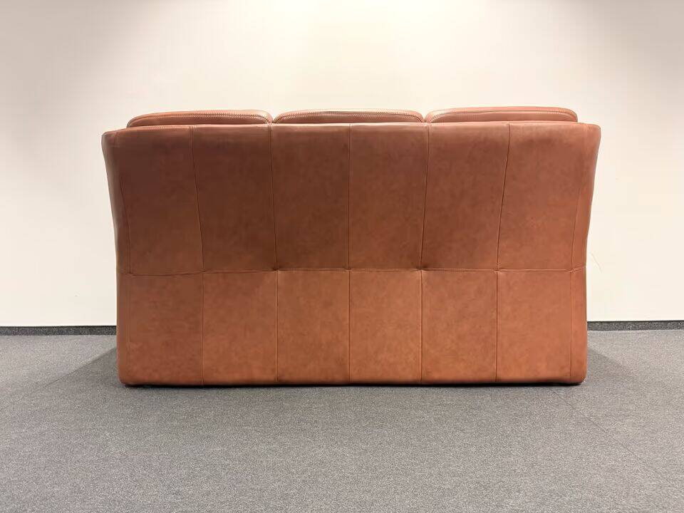 Leather  2-piece set-sofa and armchair from Elastoform