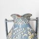 Two small blue ceramic vases