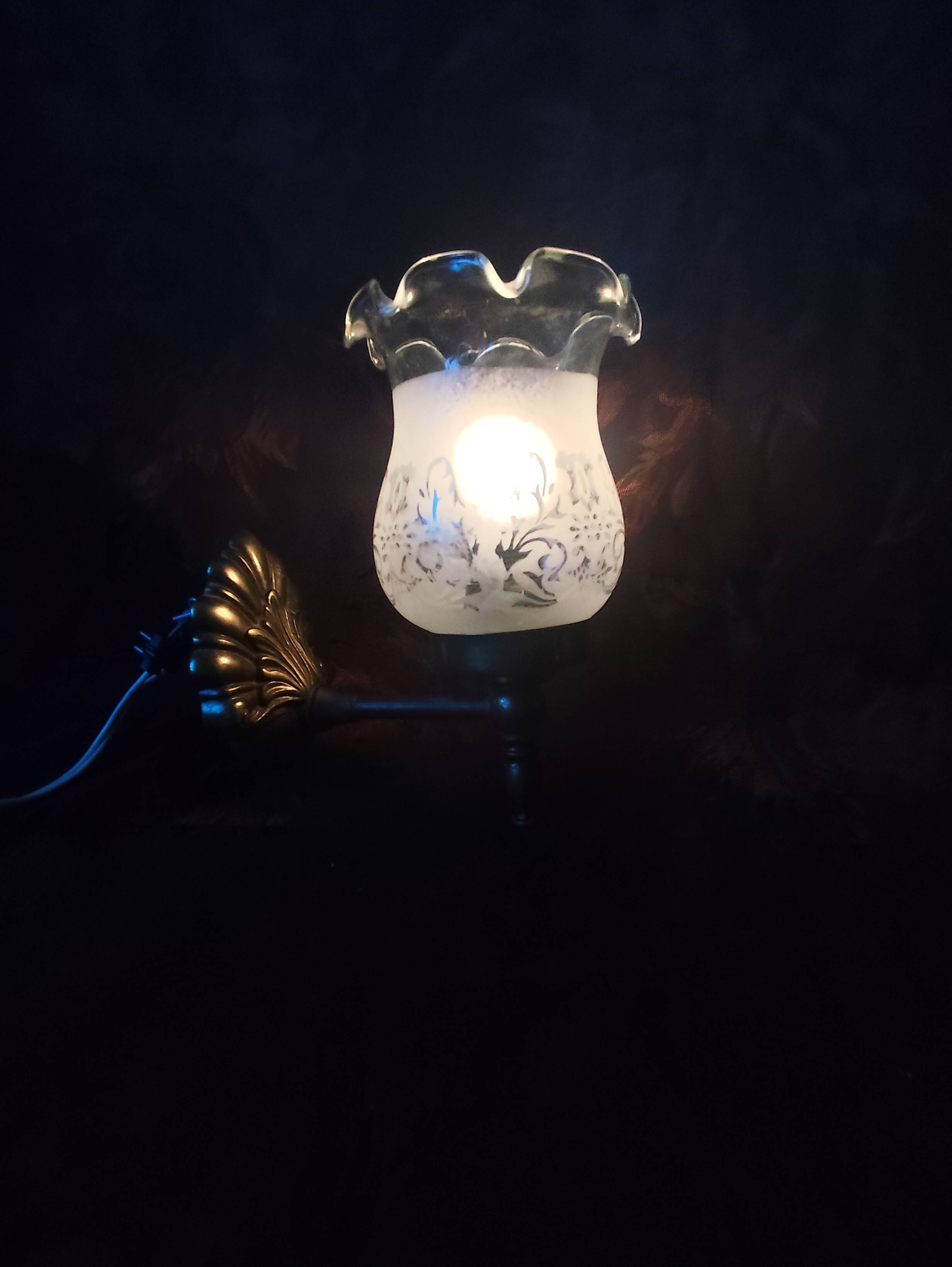 Pair of wall sconces in bronze with opaline glass tulips.