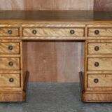 Antique desk by James Winter & Sons London in satin wood and leather.