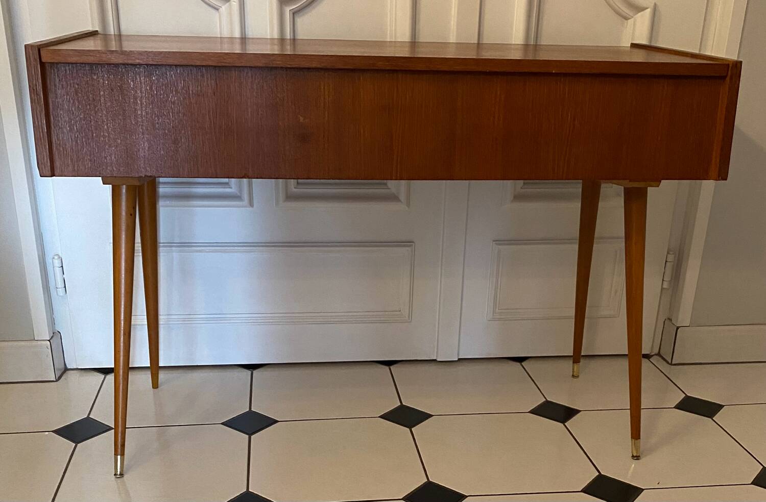 Vintage console with compass feet