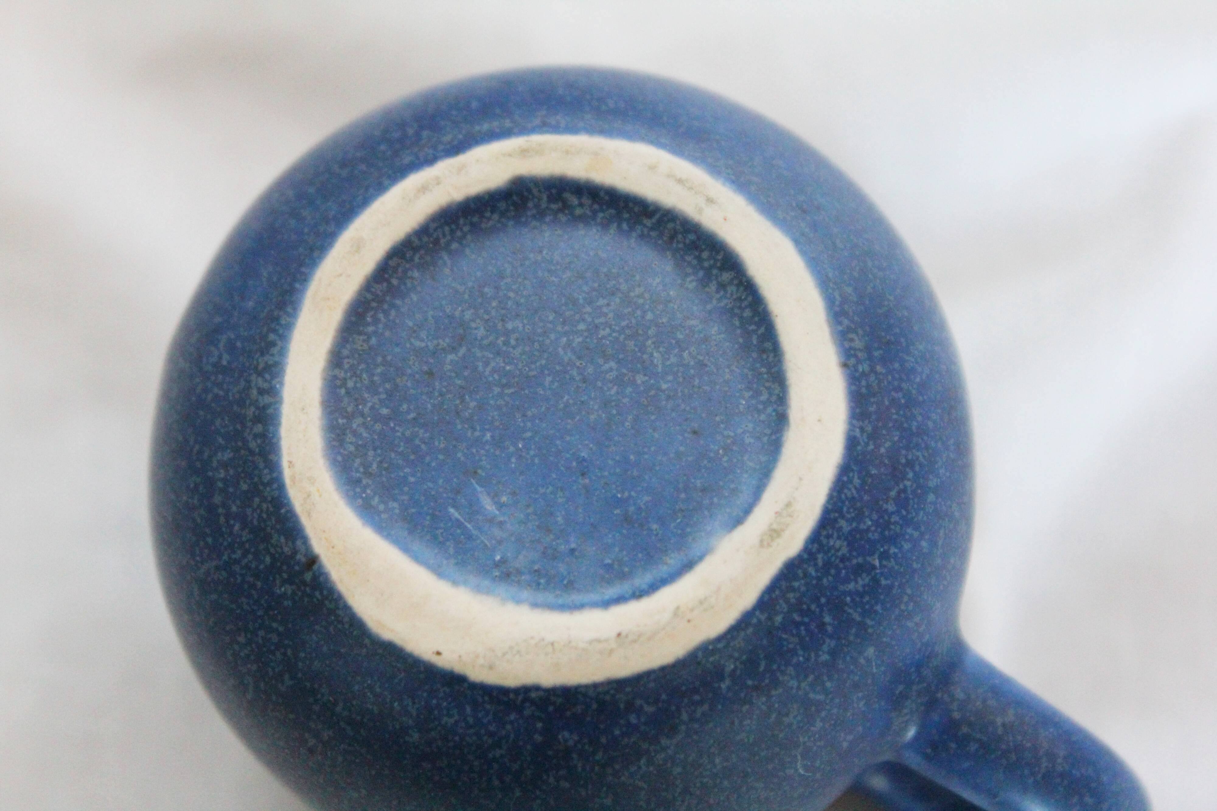 4 blue ceramic cups