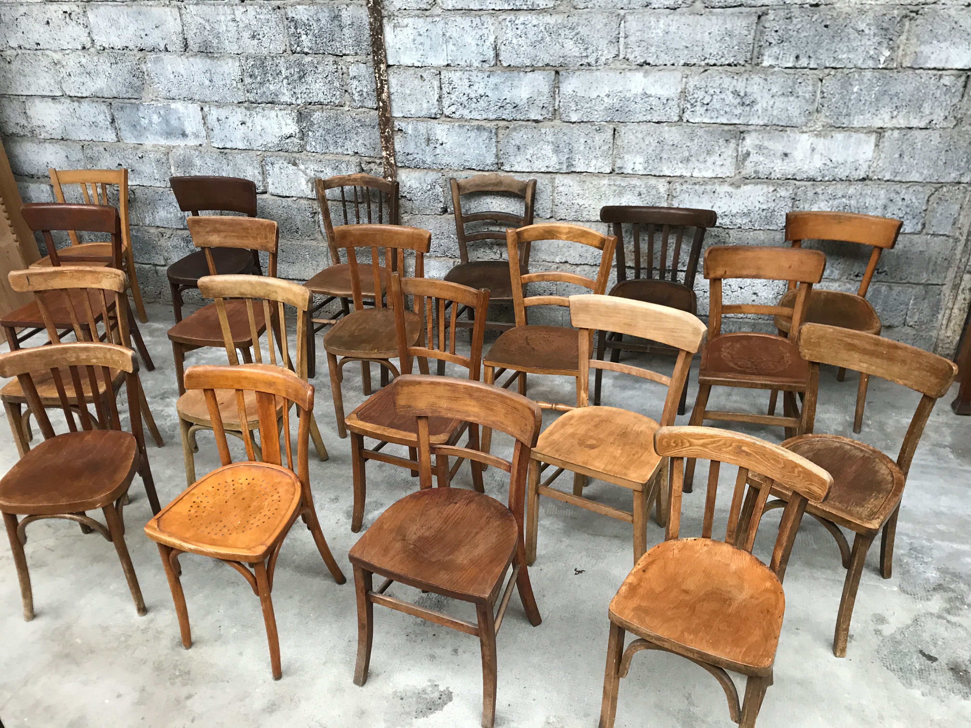 Set of 15 mismatched curved wood bistro chairs