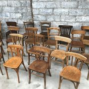 Set of 15 mismatched curved wood bistro chairs