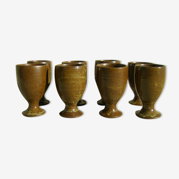 Eight vintage stoneware walking glasses