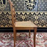 Suite de 9 chaises en cannage de style Empire - Consulat