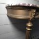 Louis XVI style console in gilded wood with a marble top.