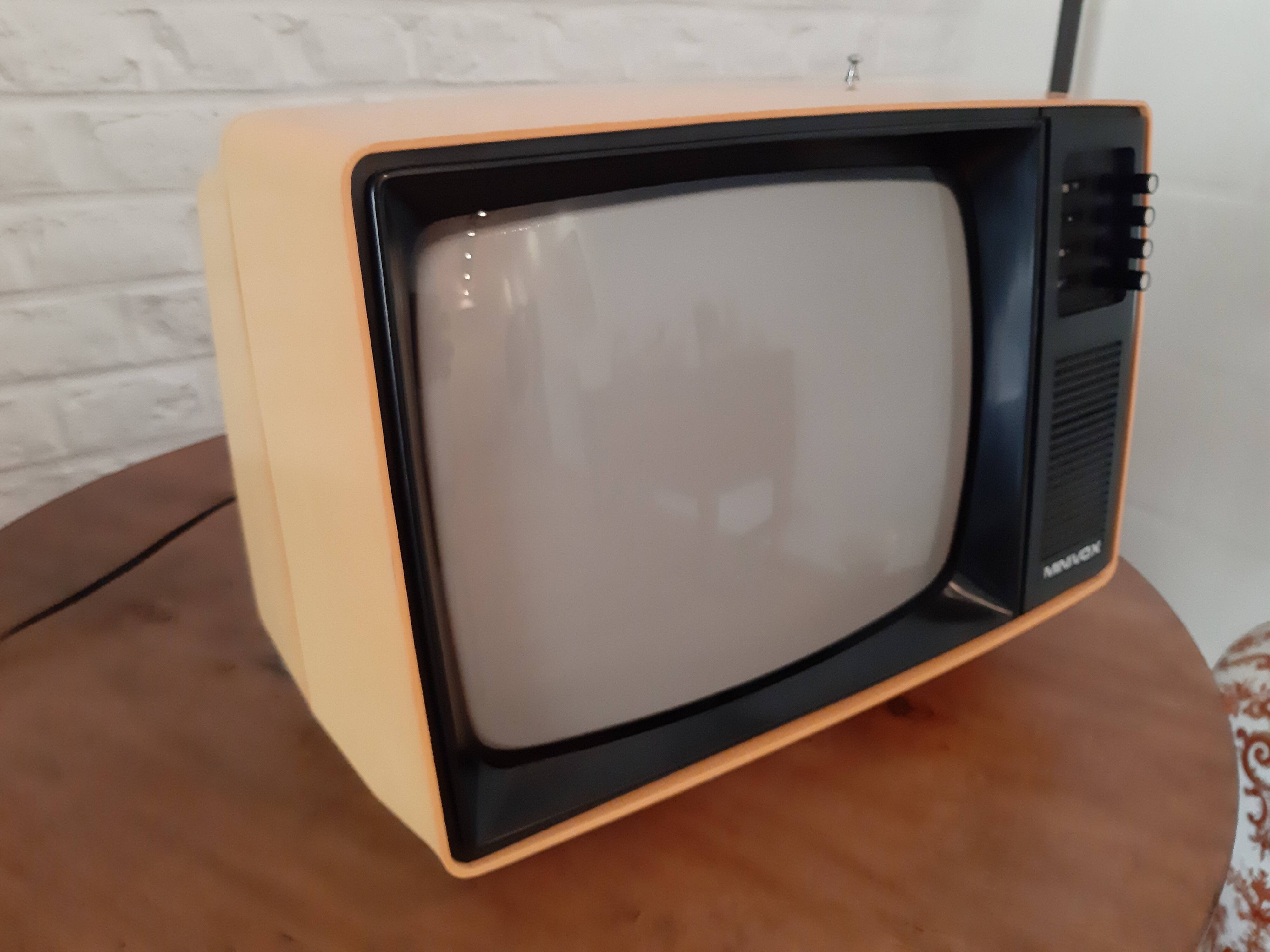 Yellow minivox vintage tv
