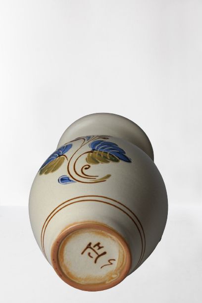 Vintage ceramic vase with bird decoration, signed.