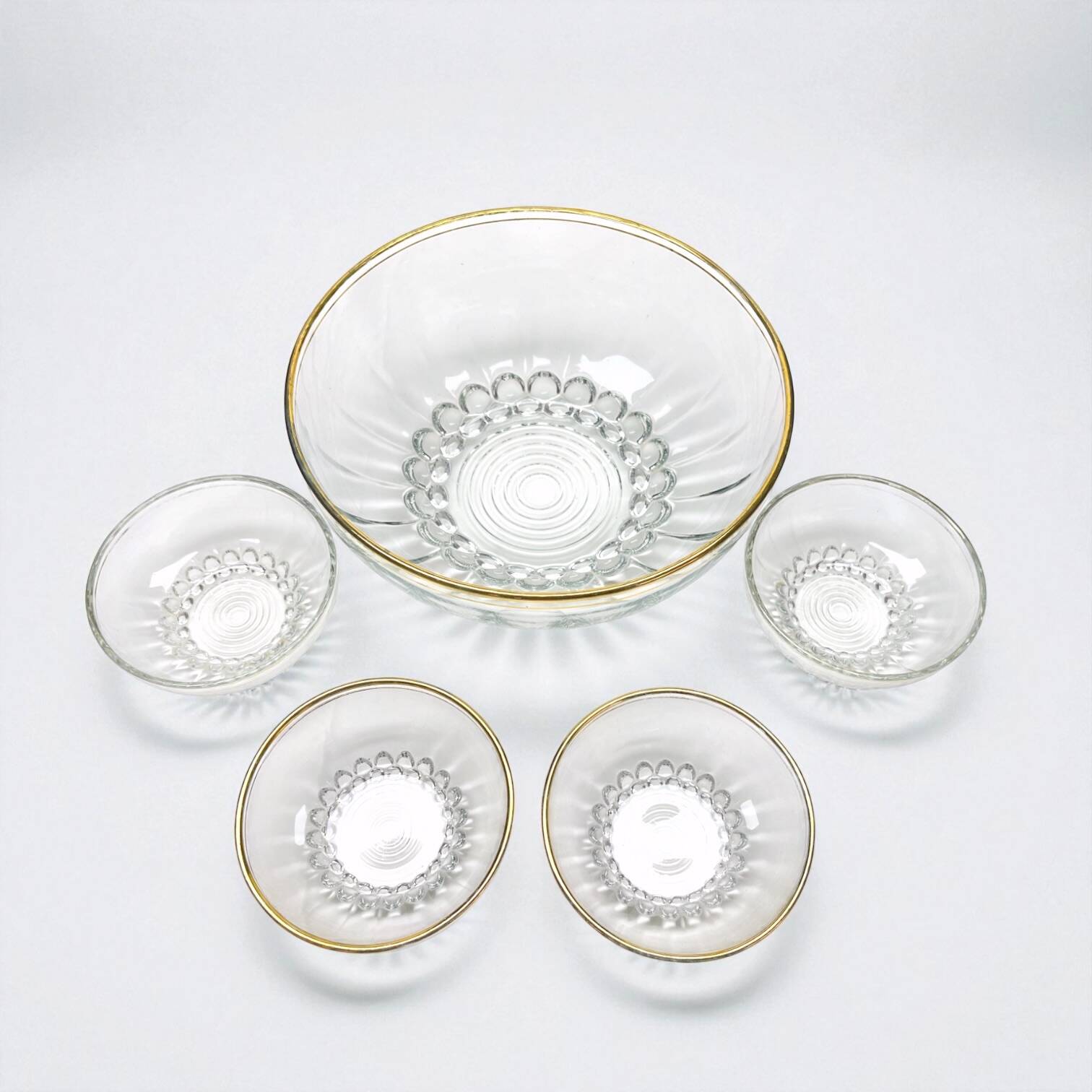 Fruit salad service in molded glass and gilt decoration with balls, 1950