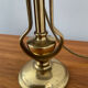 Ancienne lampe de bateau en bronze