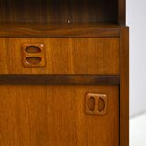 Scandinavian bookcase with bar compartment