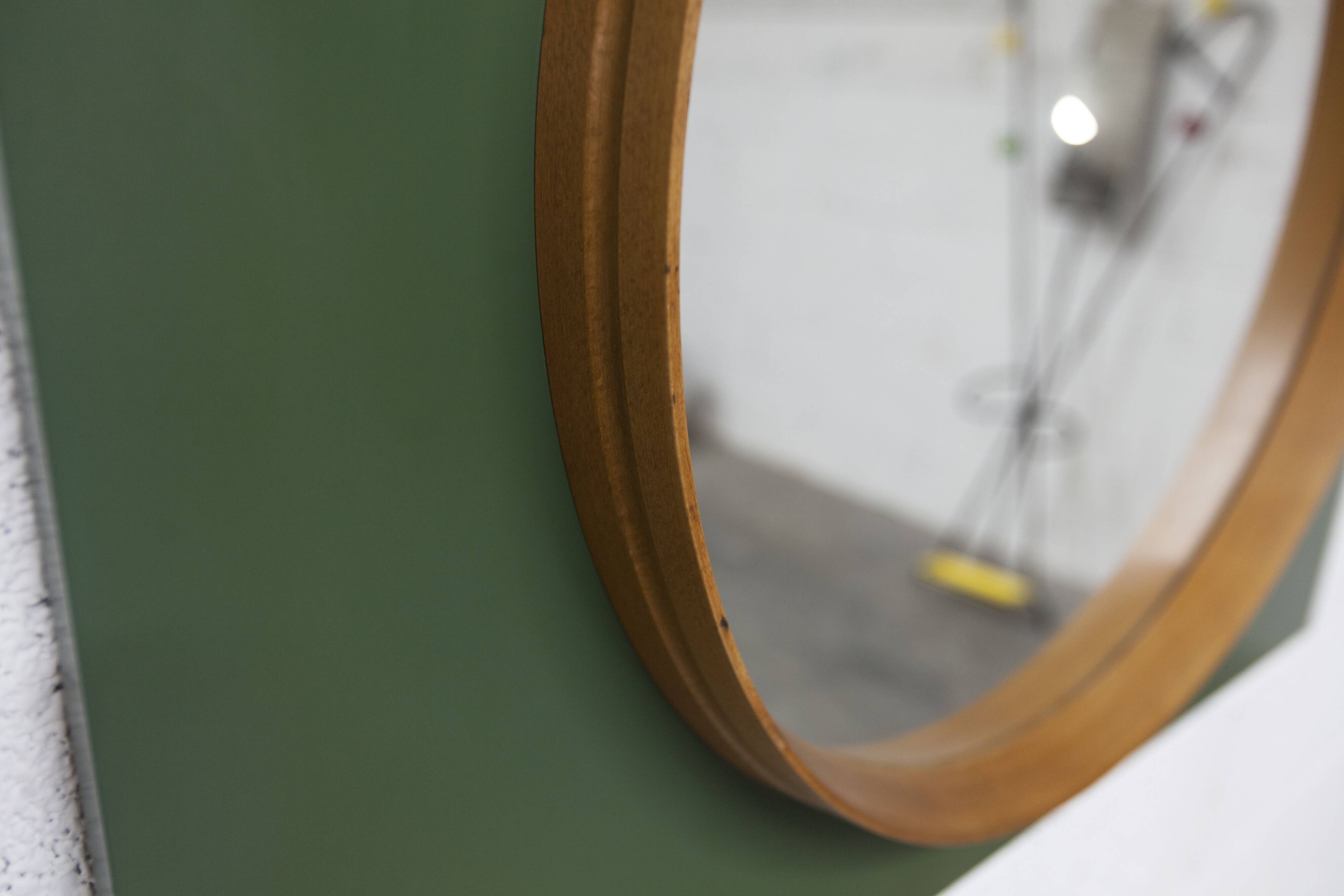 Unusual round wall mirror 60 cm teak edge on green rectangular board 1960.