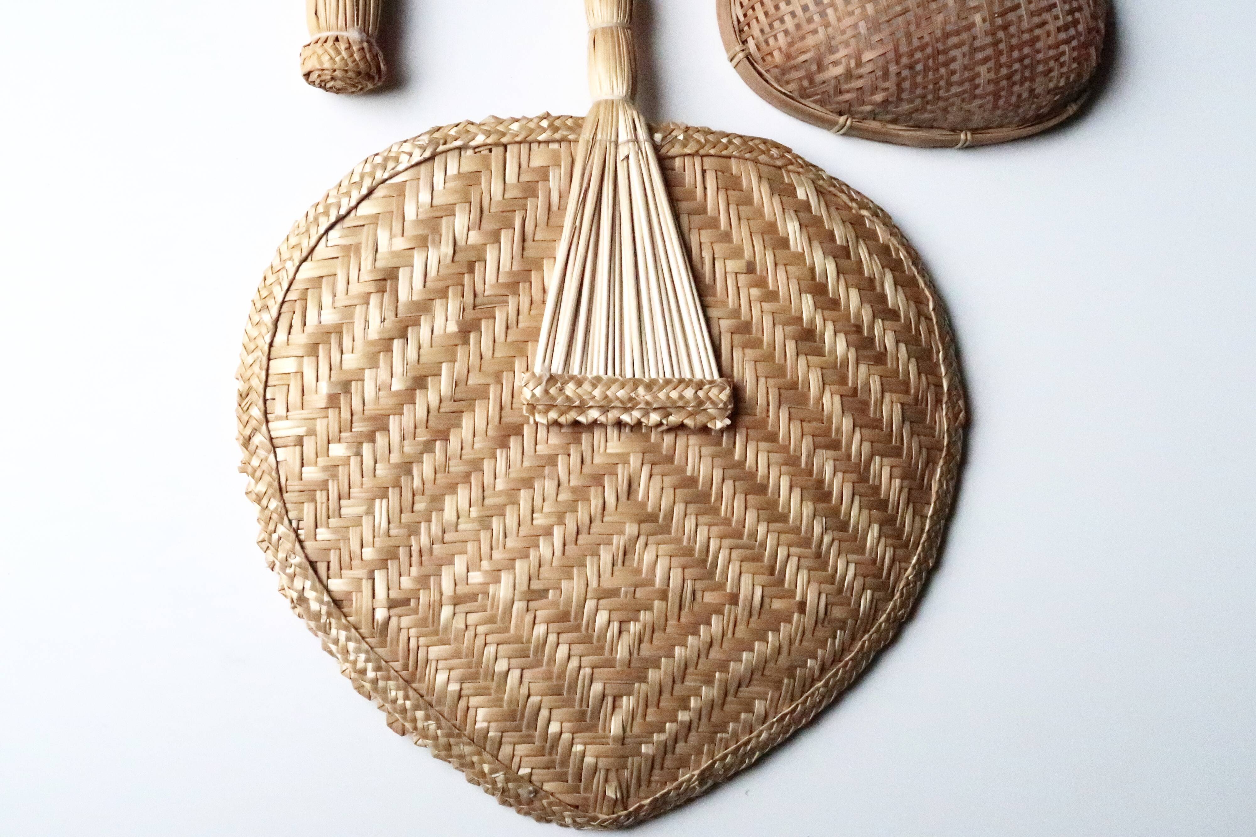 Trio of wall decorations in straw and wicker, 70s