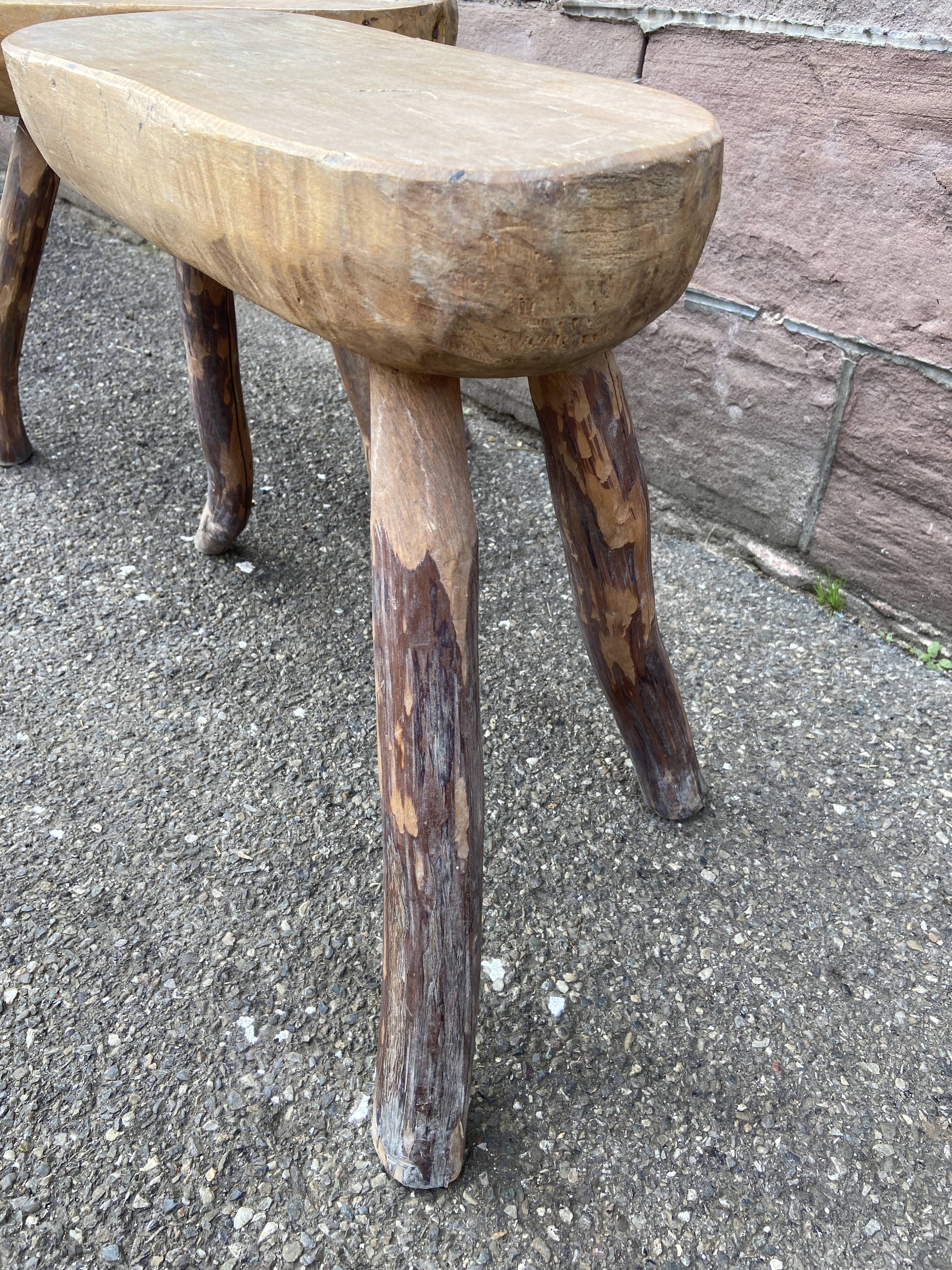 Pair of rustic 1940 brutalist wooden tripod farm stools vintage
