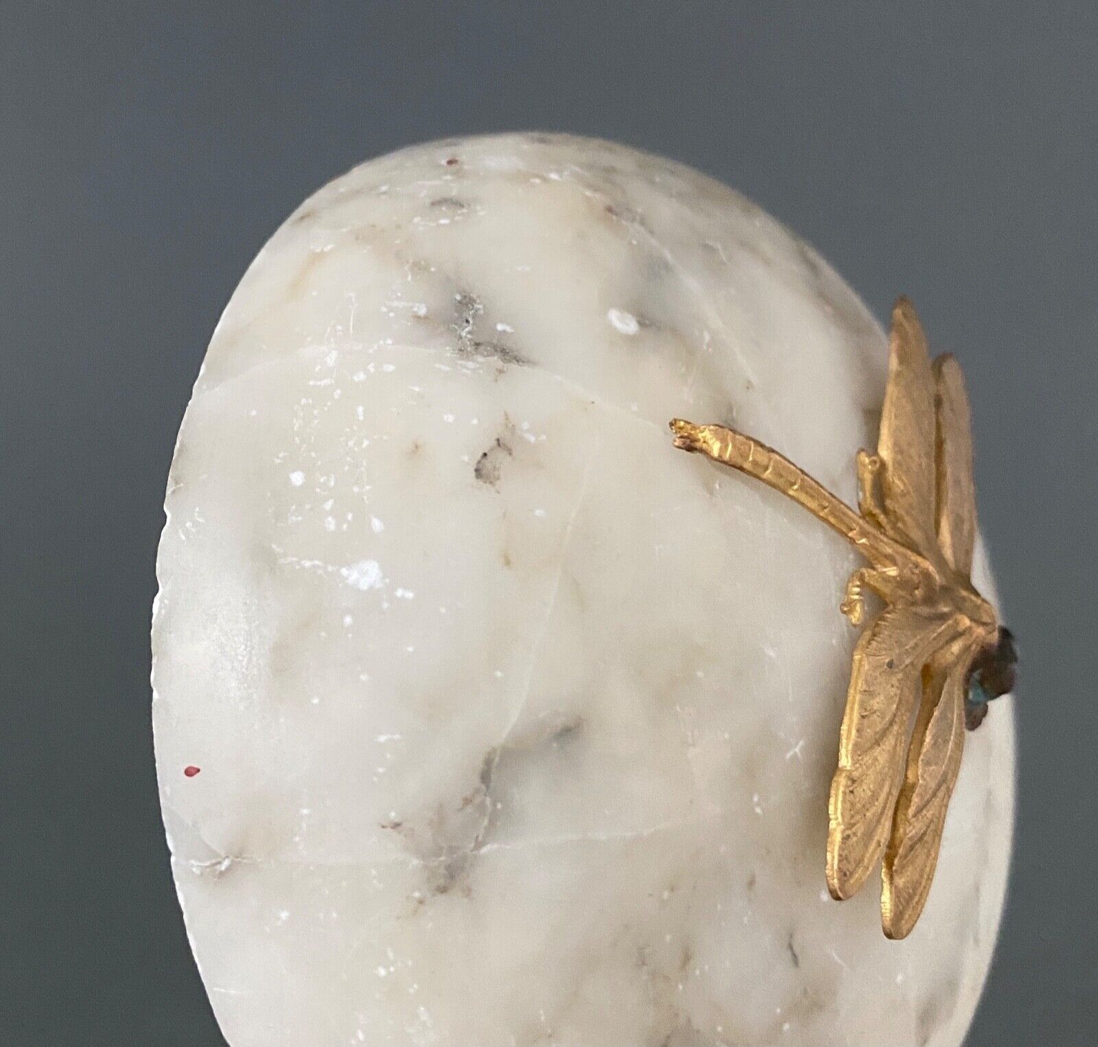 1900 alabaster ball shaped box surmounted by a golden dragonfly